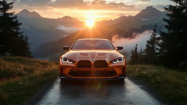 BMW M4 on a wet alpine road at dawn with pale orange light, trees and mist.