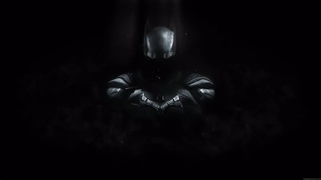 Batman emerging from black shadow with silver armor highlights