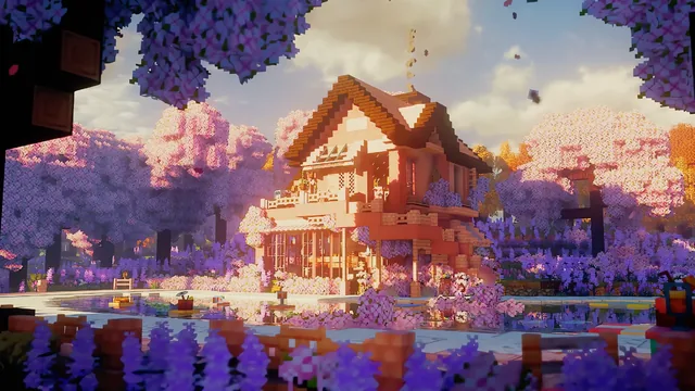 Minecraft house beside a clear pond with cherry blossom trees and colorful gardens