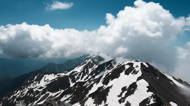 Mountain and surrounding clouds in an atmospheric landscape