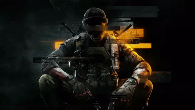Troy Marshall in tactical gear holding a rifle under cold operational light