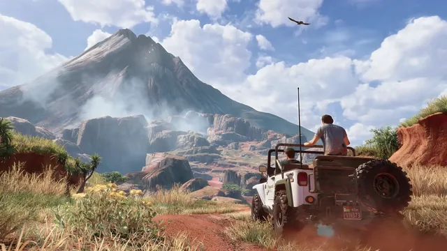 Nathan Drake beside an off-road Jeep facing a towering volcano in Uncharted 4