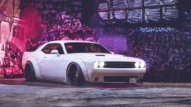 White Dodge Challenger beside graffiti on a pink neon rain-wet street